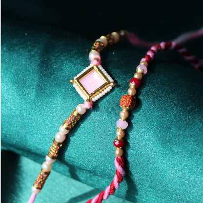 pink grace rakhi set of 2
