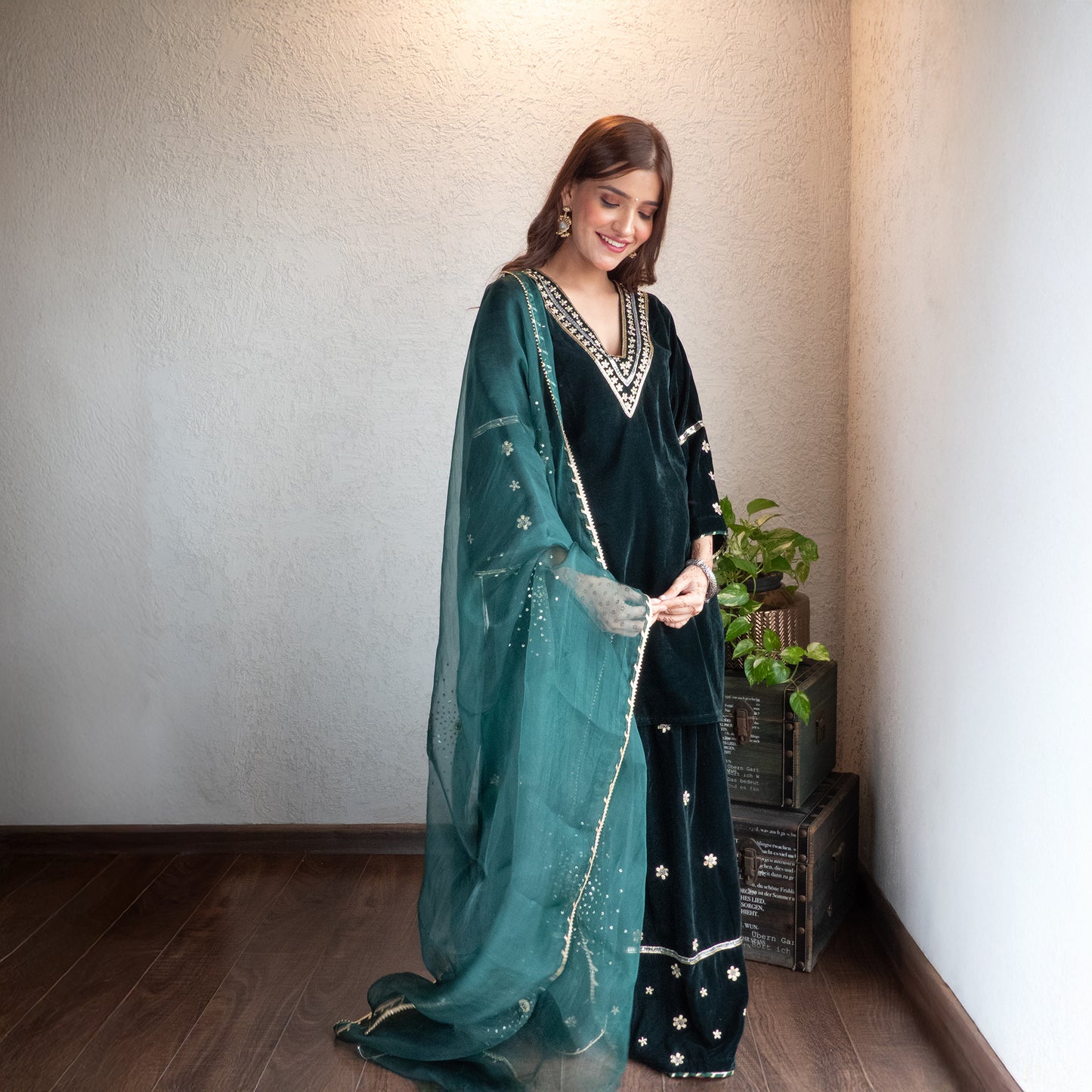 Green velvet hand embroidered sharara set with Dupatta