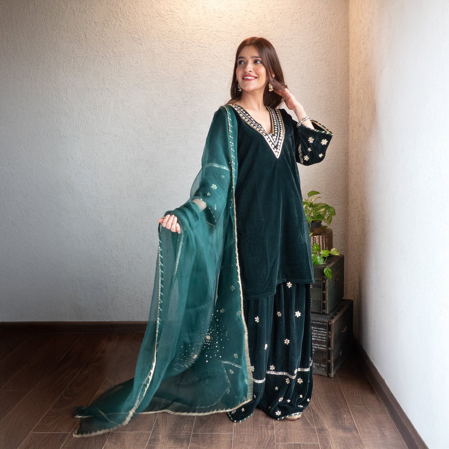 Green velvet hand embroidered sharara set with Dupatta