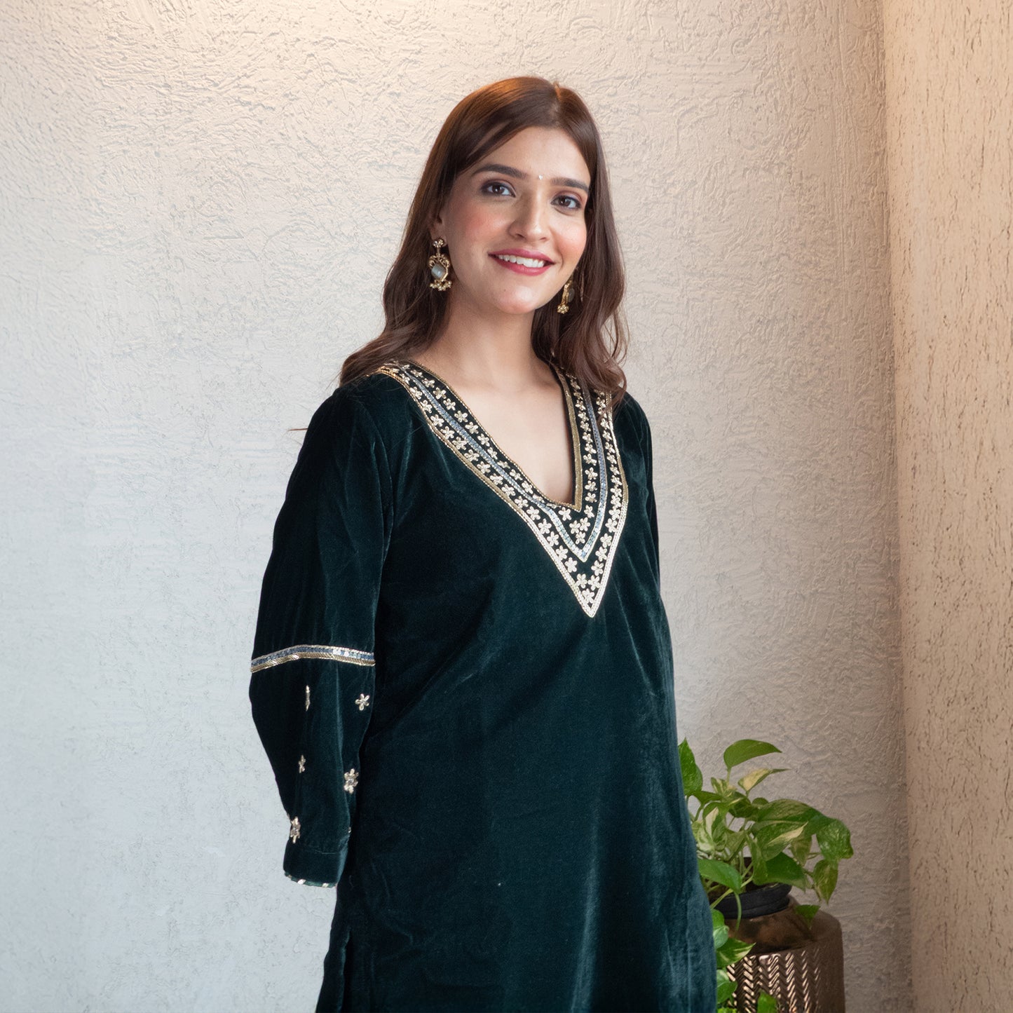 Green velvet hand embroidered sharara set with Dupatta