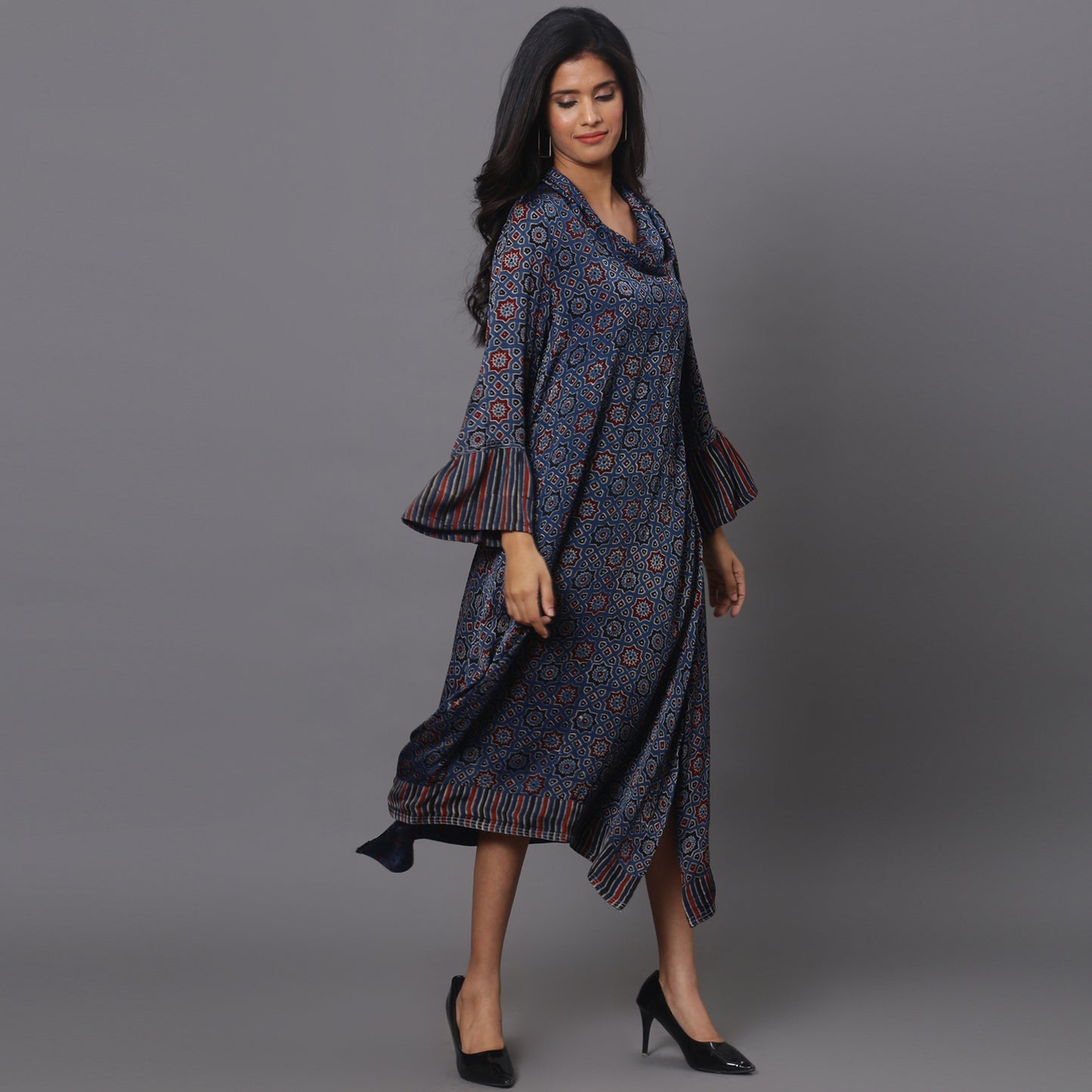 Asymetric cowl neck dress in ajrakh modal silk fabric with flared sleeves.