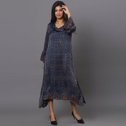 Asymetric cowl neck dress in ajrakh modal silk fabric with flared sleeves.