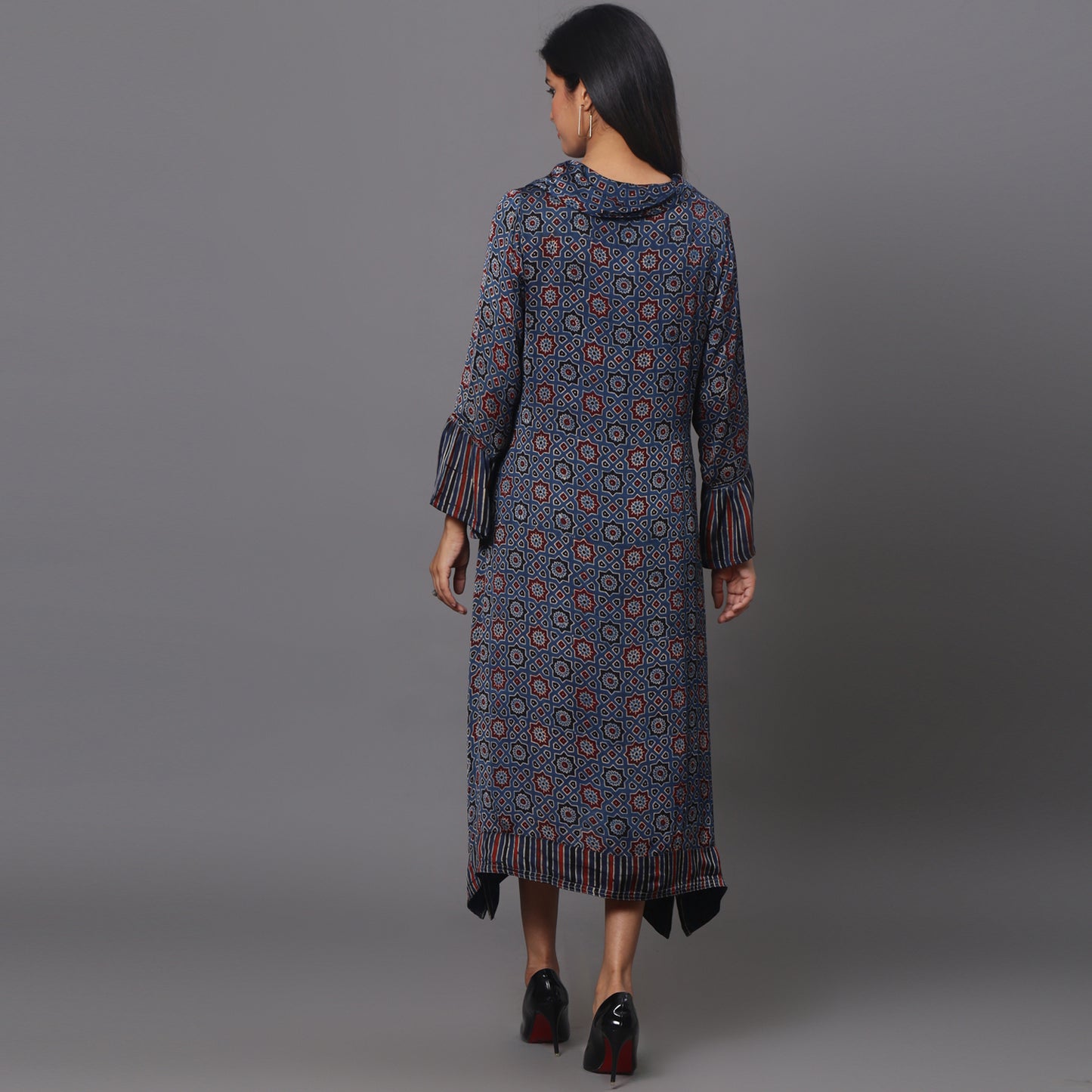 Asymetric cowl neck dress in ajrakh modal silk fabric with flared sleeves.