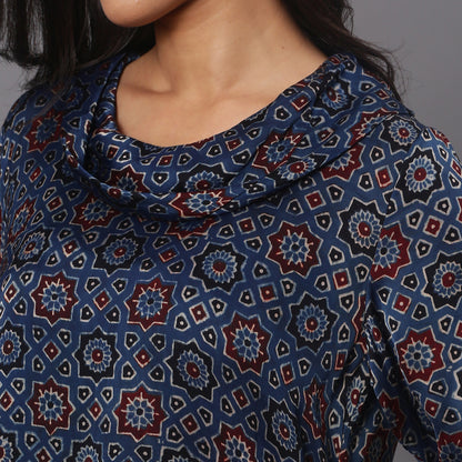 Asymetric cowl neck dress in ajrakh modal silk fabric with flared sleeves.