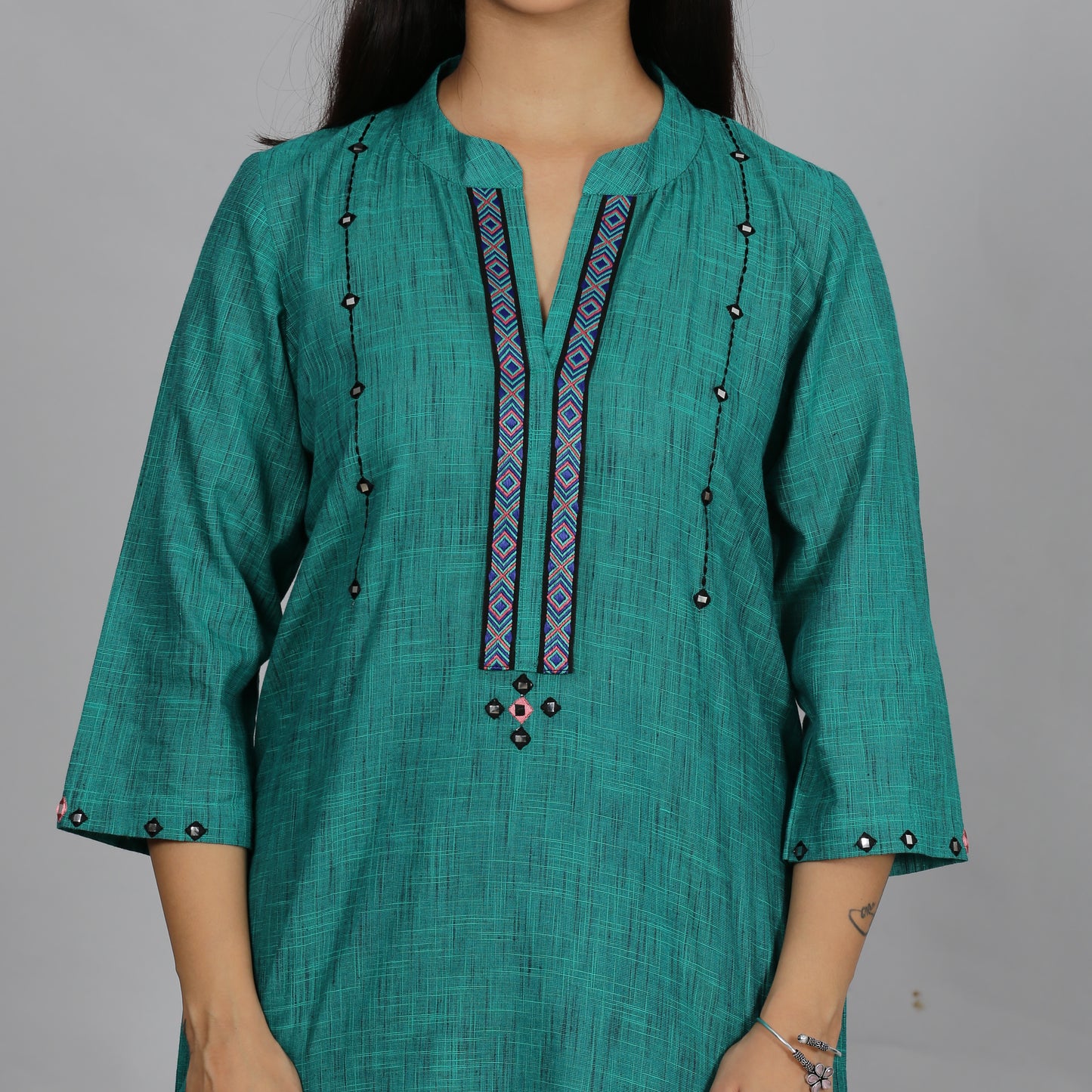 Teal Solid short kurta with neck detailing