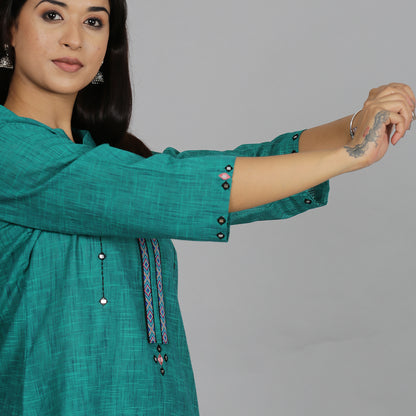 Teal Solid short kurta with neck detailing