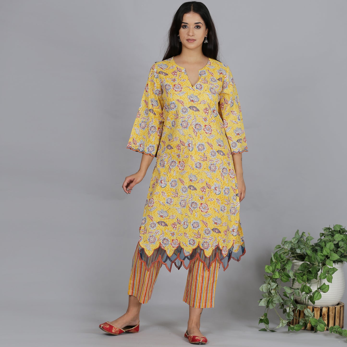 Yellow printed A-line kurta set with Organza detailing