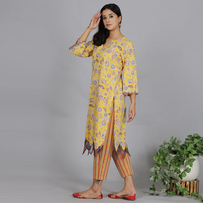 Yellow printed A-line kurta set with Organza detailing