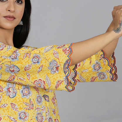 Yellow printed A-line kurta set with Organza detailing