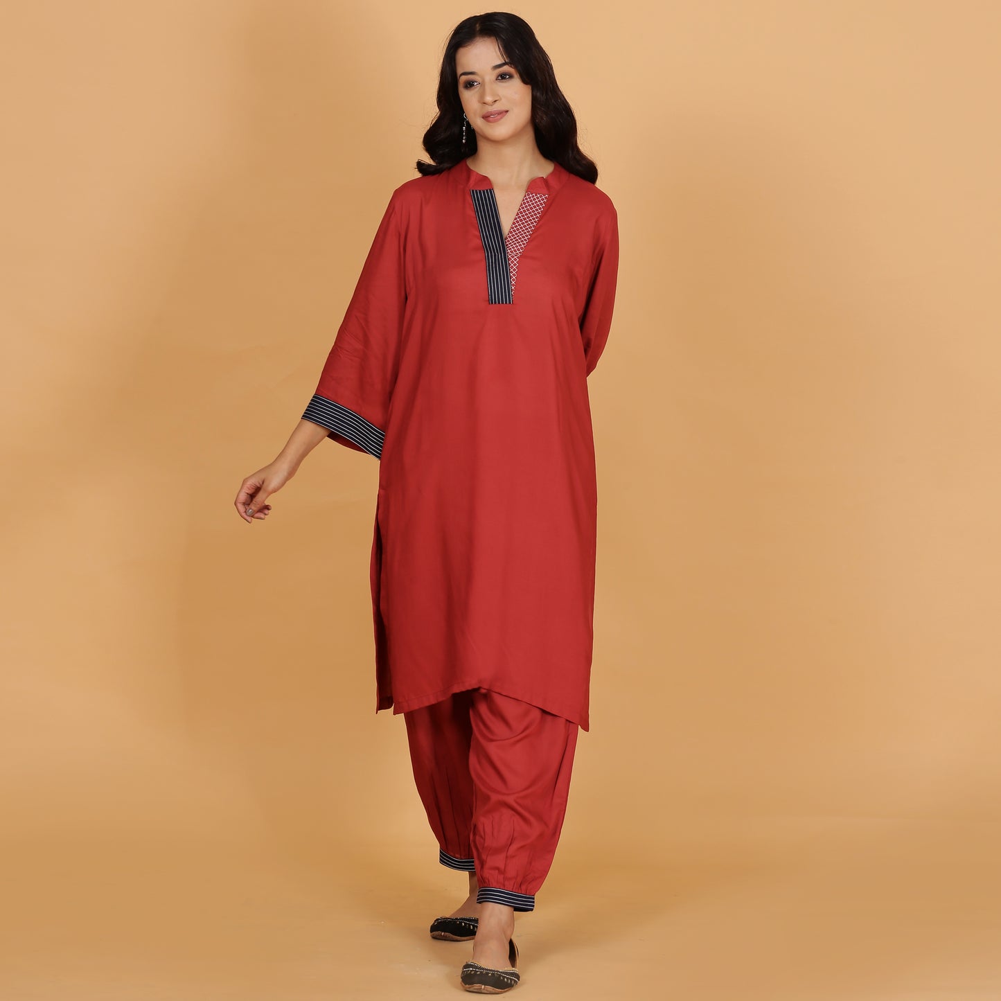 Rust solid Cotton Modal A-line kurta set with neck and detailing