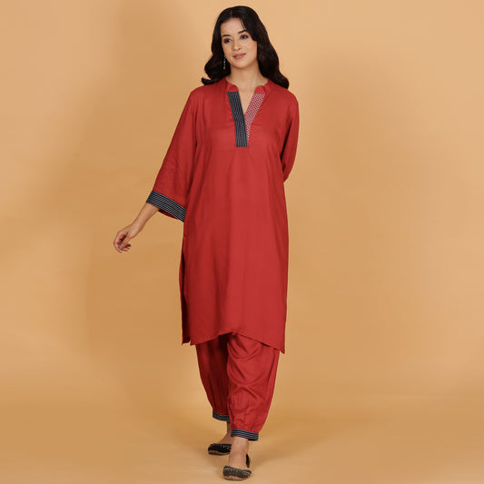 Rust solid Cotton Modal A-line kurta set with neck and detailing