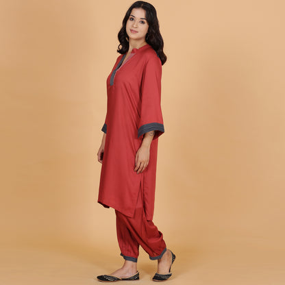 Rust solid Cotton Modal A-line kurta set with neck and detailing