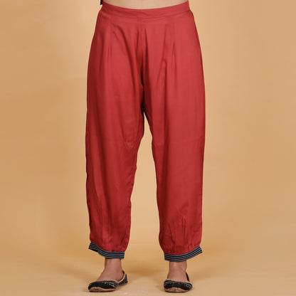 Rust solid Cotton Modal A-line kurta set with neck and detailing