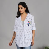 White toucan print shirt with embroidery on the pocket