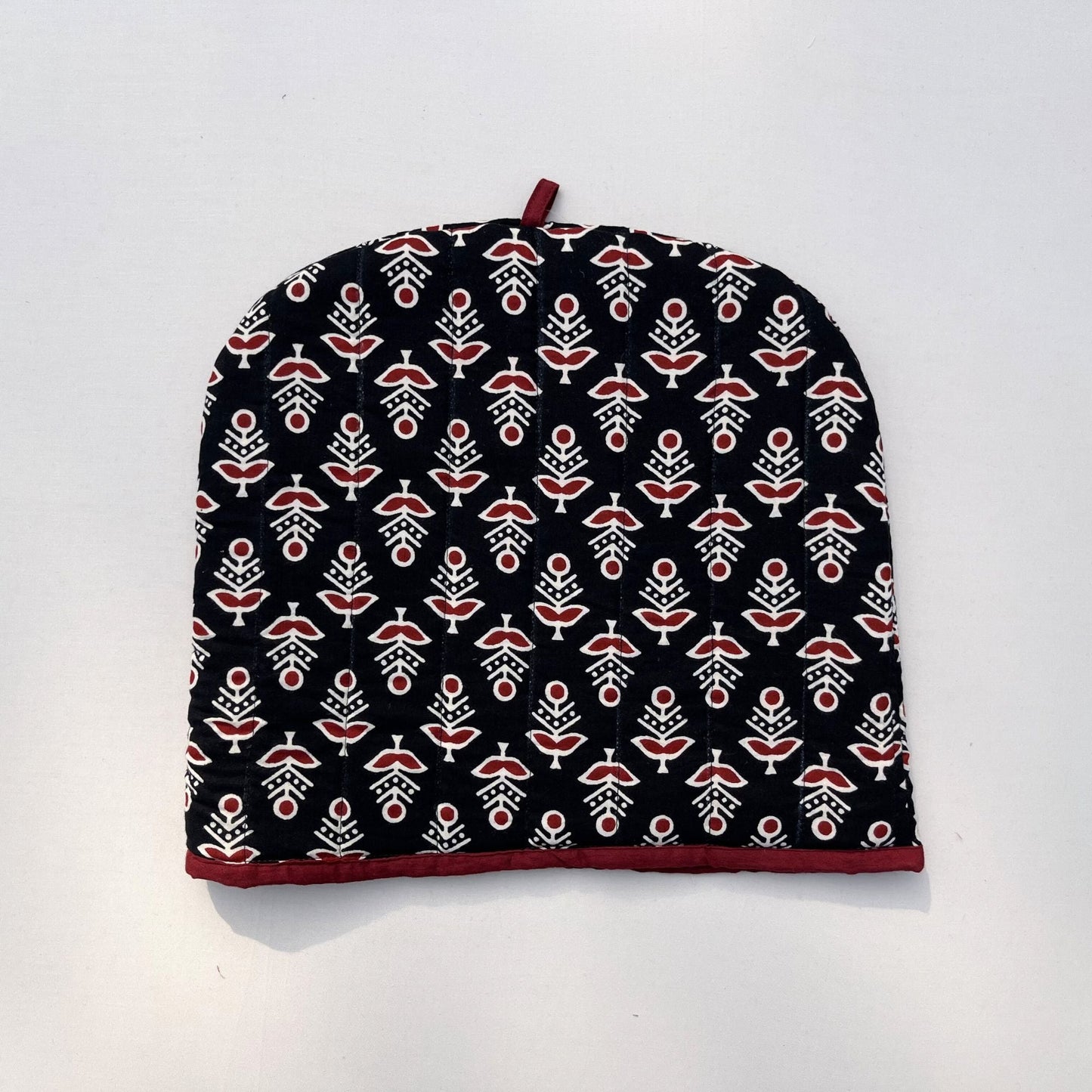 Black printed tea cosy set
